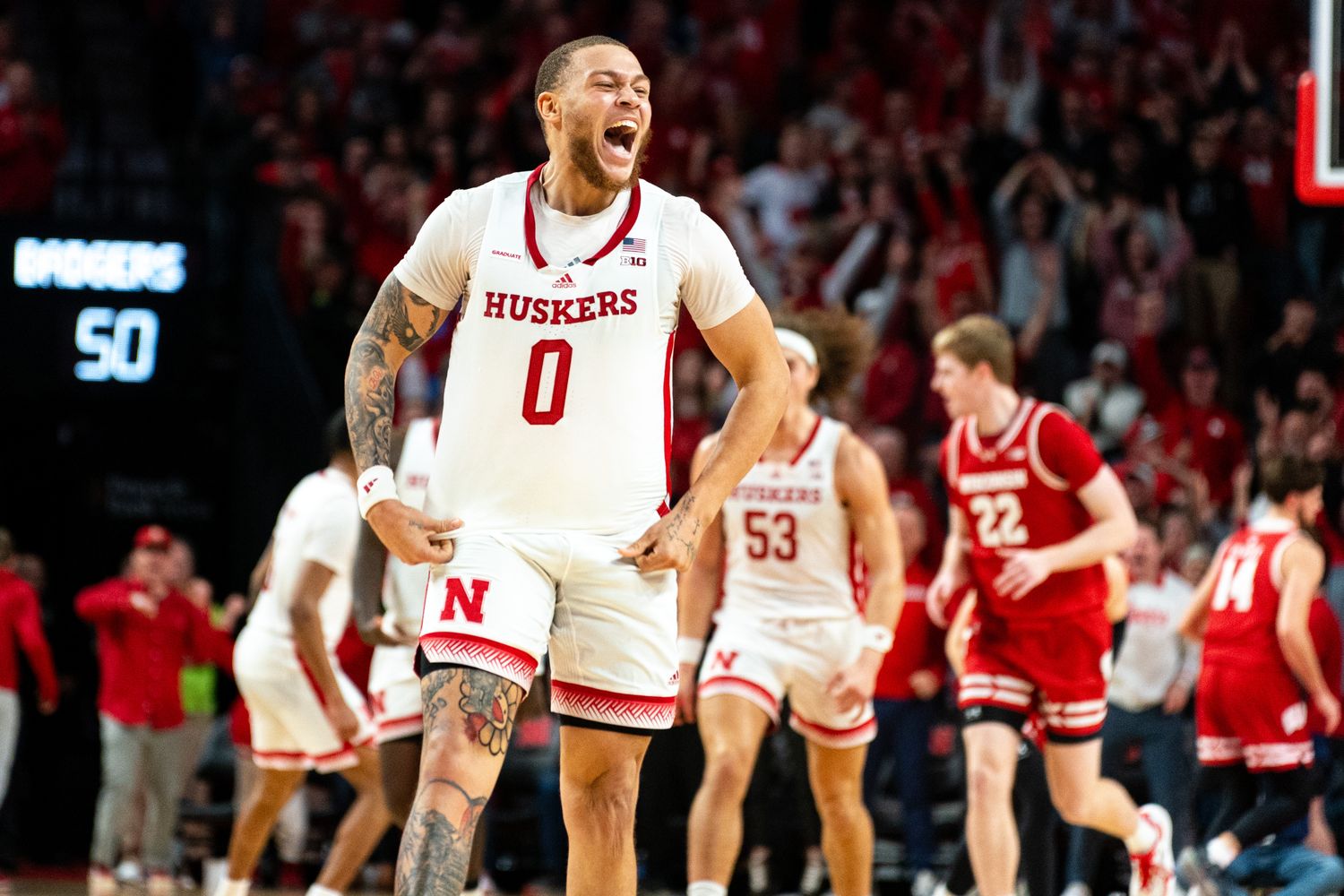 Feb 1, 2024; Lincoln, Nebraska, USA; Nebraska Cornhuskers guard C.J. Wilcher (0) celebrates after a three-point shot against the Wisconsin Badgers during the second half at Pinnacle Bank Arena.